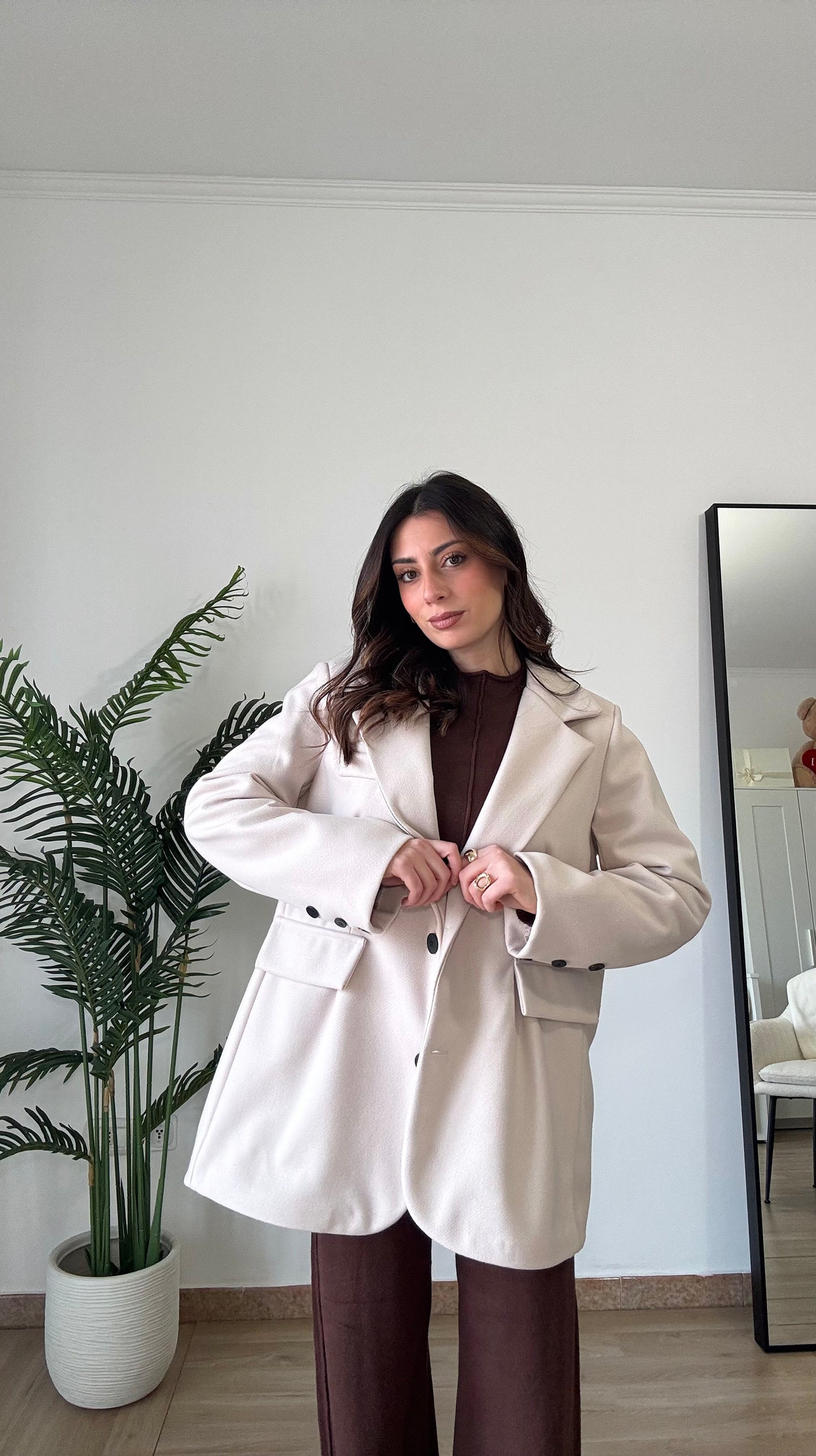 COAT OVER